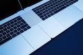 Two new professional Apple MacBook Pro 16 15 laptops on the same table Royalty Free Stock Photo