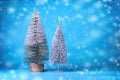 Two New Year tree on a blue background. Copy space. Place for text. Christmas, New Year background. Royalty Free Stock Photo