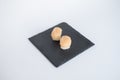 Two Nigiri Sushi with scallop served on black tray. Royalty Free Stock Photo