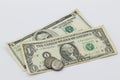 Two notes: dollar bills and two vintage coins isolated on white Royalty Free Stock Photo