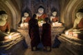 Novice Buddhist Monks Praying Inside Bagan Temple, Myanmar