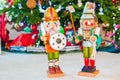 Two Nutcrackers at Base of Christmas Tree