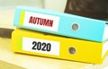 Two office folders with text AUTUMN 2020, business concept