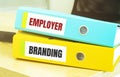 Two office folders with text EMPLOYER BRANDING Royalty Free Stock Photo