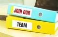 Two office folders with text JOIN OUR TEAM Royalty Free Stock Photo
