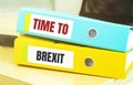 Two office folders with text TIME TO BREXIT
