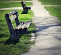 Two old abandoned benches in park Royalty Free Stock Photo