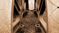 Two old and abandoned train`s wheels side by side mirroring each other [Sepia colors] Royalty Free Stock Photo