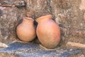 Two old amphoras in castle of Pena de la Encina Royalty Free Stock Photo