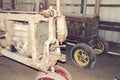 Old tractors in a barn Royalty Free Stock Photo