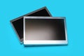 Two old automotive LCD display spares on blue background Royalty Free Stock Photo