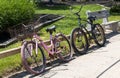 Two old bicycles leaning against a fence in Ocean Beach Village on Fire Island Royalty Free Stock Photo