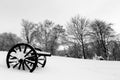 Two old cannons in snow at Mount Royal Cemetery Royalty Free Stock Photo