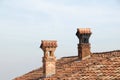 Old chimneys on the roof Royalty Free Stock Photo