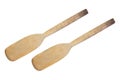 two old cooking wood paddles isolated on white Royalty Free Stock Photo