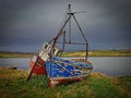 Two old fishing boats spend their last days together. Royalty Free Stock Photo