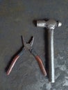 two old friends pliers and hammer Royalty Free Stock Photo