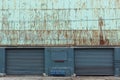 Two old garage doors of a warehouse