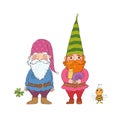Two old garden gnomes and a bee. Forest elves Royalty Free Stock Photo