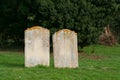 Two old gravestones close together. Royalty Free Stock Photo