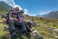 old hikers with large backpacks resting on mountain Kackarlar Royalty Free Stock Photo