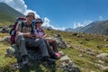 old hikers with large backpacks resting on mountain Kackarlar Royalty Free Stock Photo