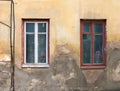 Two old house Windows and a wall Royalty Free Stock Photo