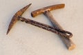 Two old iron rusted mining picks Royalty Free Stock Photo