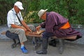 Two old men are playing chess in park of Royalty Free Stock Photo