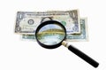 Two old one dollar bills under a magnifying glass Royalty Free Stock Photo