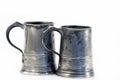 Two old quart pewter drinking jars