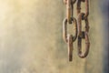 Two old rusty chains were hanging down from above. Royalty Free Stock Photo
