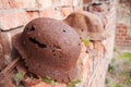 Two old rusty military helmets