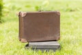 Two old suitcase on grass Royalty Free Stock Photo