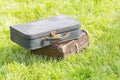 Two old suitcase on grass Royalty Free Stock Photo