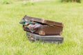 Two old suitcase on grass Royalty Free Stock Photo