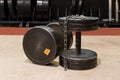 Two old and used gym black metal dumbbells with silver chain. Gym equipment Royalty Free Stock Photo