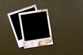 Two old vintage stained polaroid style blank photo print frames Royalty Free Stock Photo