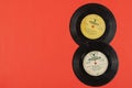 Two old vinyl records of Soviet music on red. Gramophone records Royalty Free Stock Photo