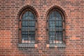 Two old windows , gothic church building exterior Royalty Free Stock Photo