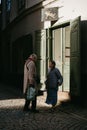 Two old women talking on the streets of Stockholm