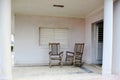 Two old wooden chairs on the porch Royalty Free Stock Photo