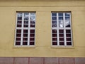 Two Old wooden windows on old Russian-comunist type style building