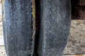 Two old worn tires of an old and abandoned trailer