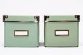 Two olive green home storage boxes