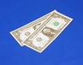 Two one dollar bills at an angle Royalty Free Stock Photo