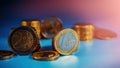 Two and one euro against the background of euro cent coins Royalty Free Stock Photo