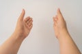 Two open empty female hands with palms up, holding something, isolated on white background Royalty Free Stock Photo