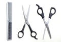 Two open scissors and comb barber isolated Royalty Free Stock Photo