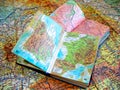 Two opened old atlas book on the spread map Royalty Free Stock Photo